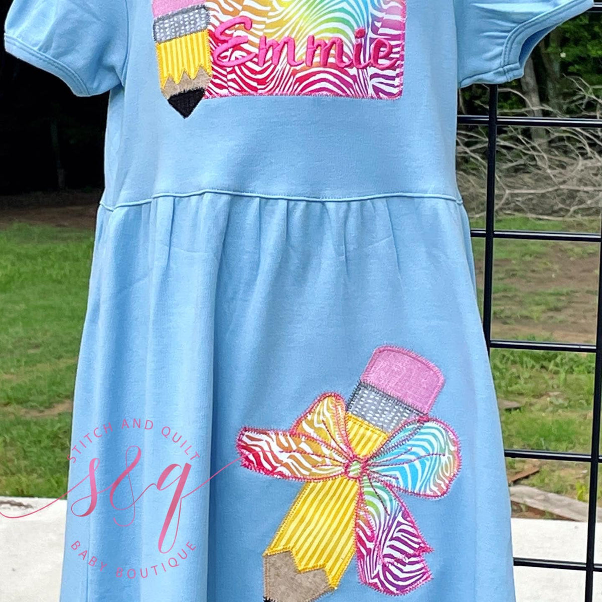 Girl&#39;s Back to school dress with pencil design