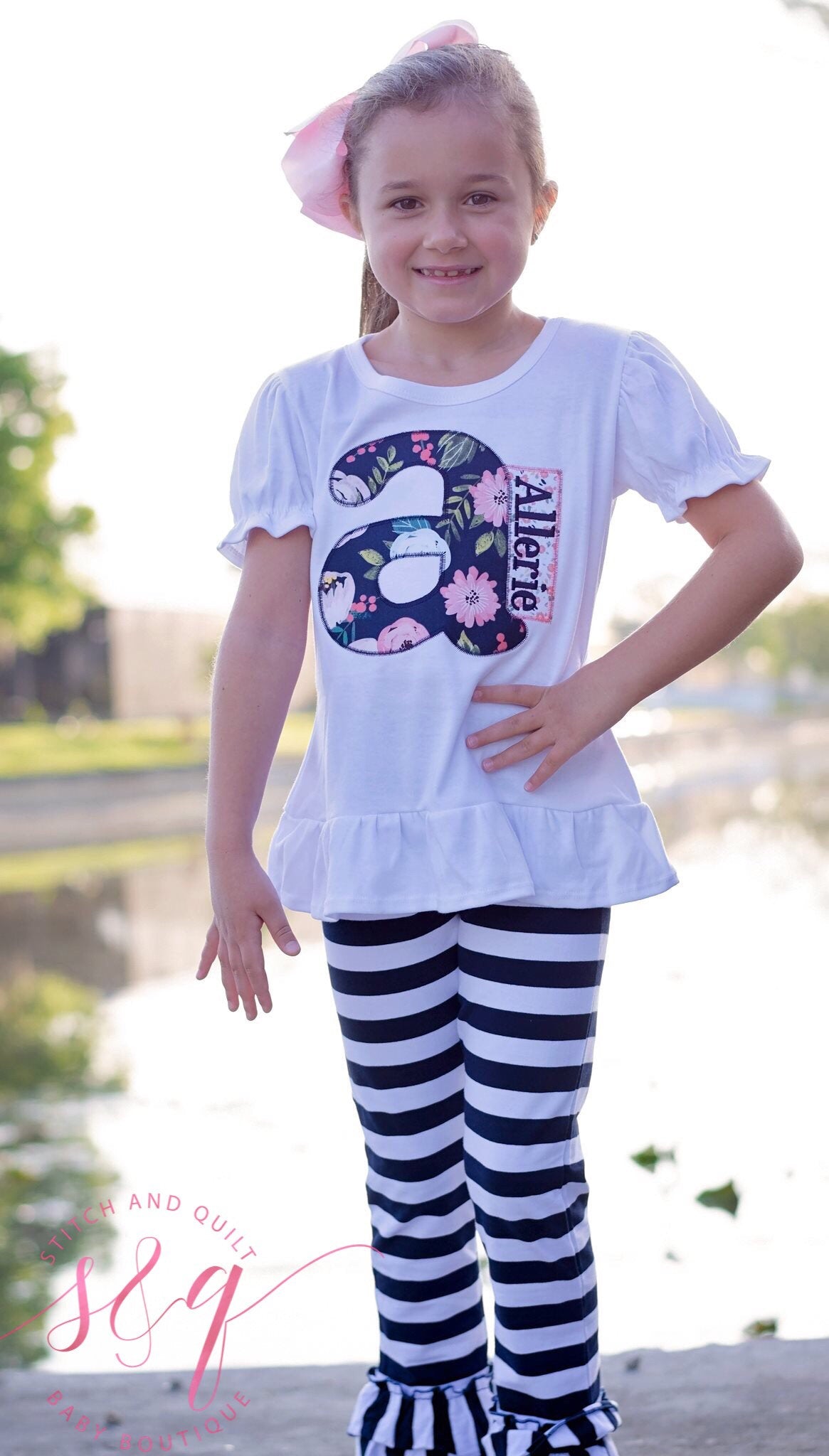 Girl&#39;s floral Letter shirt with matching navy pants